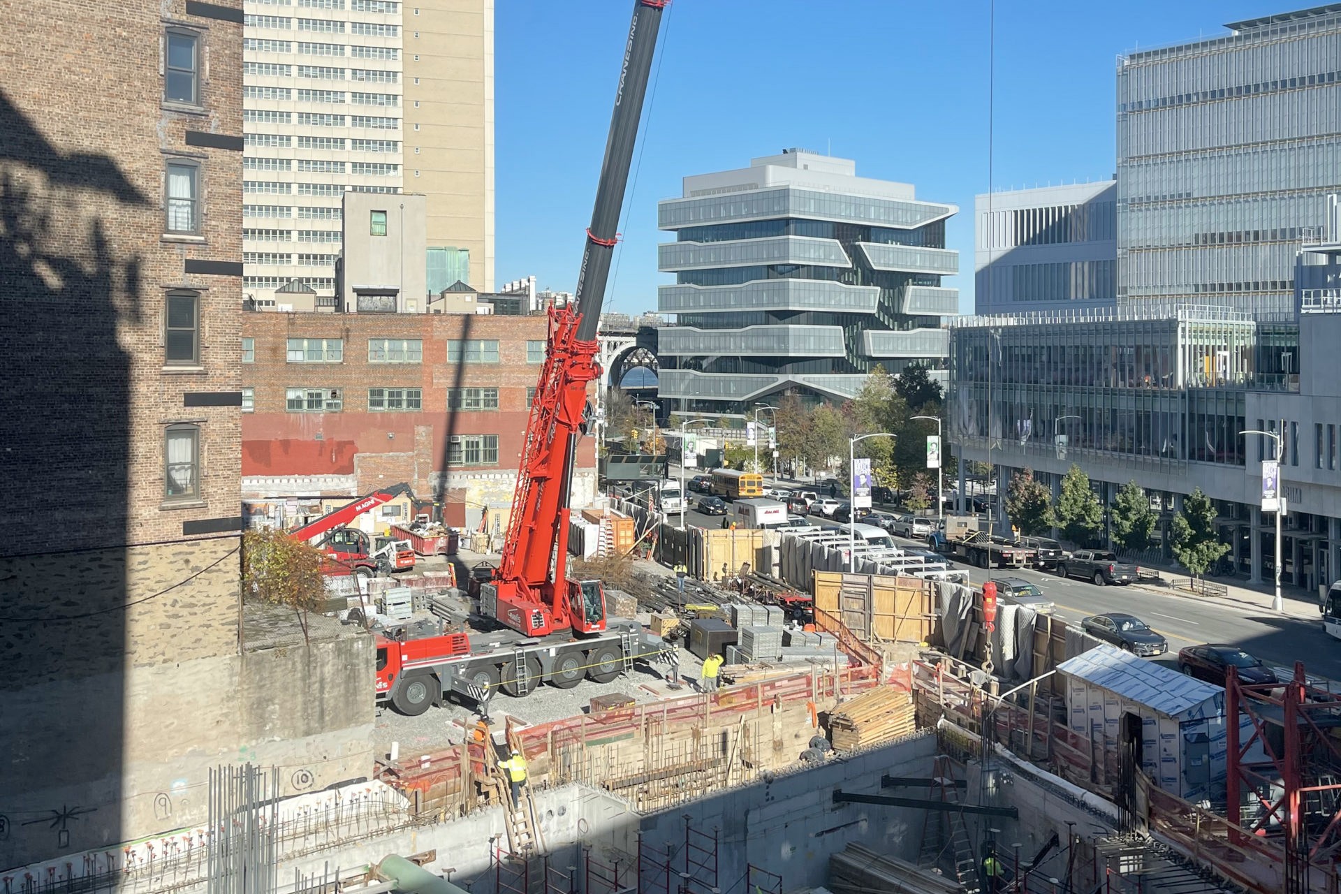 A view of the construction site of 600 W. 125th Street with a large crane parked in the middle.