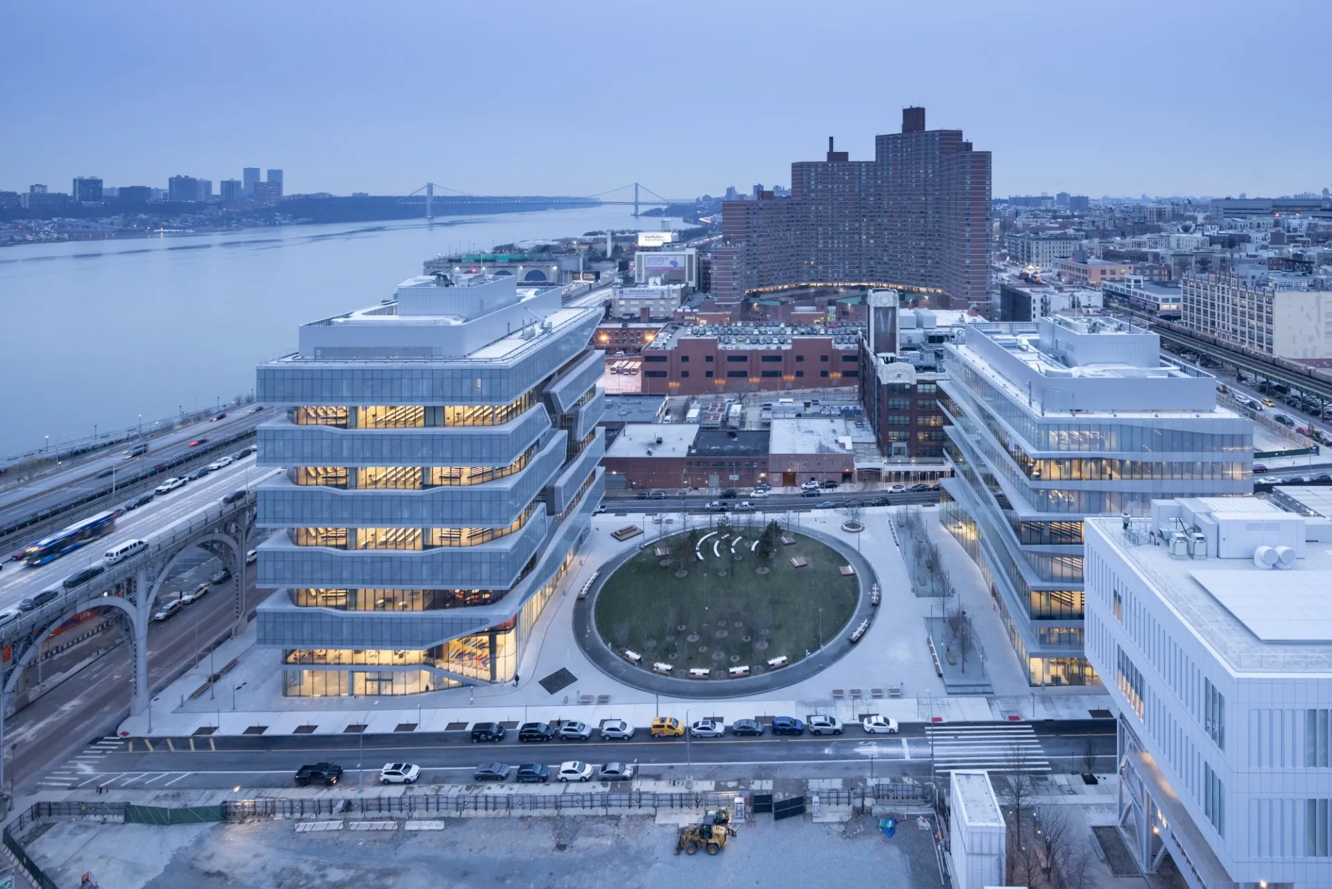 An aerial view of Columbia Business School and The Square, with upper Manhattan in the distance.