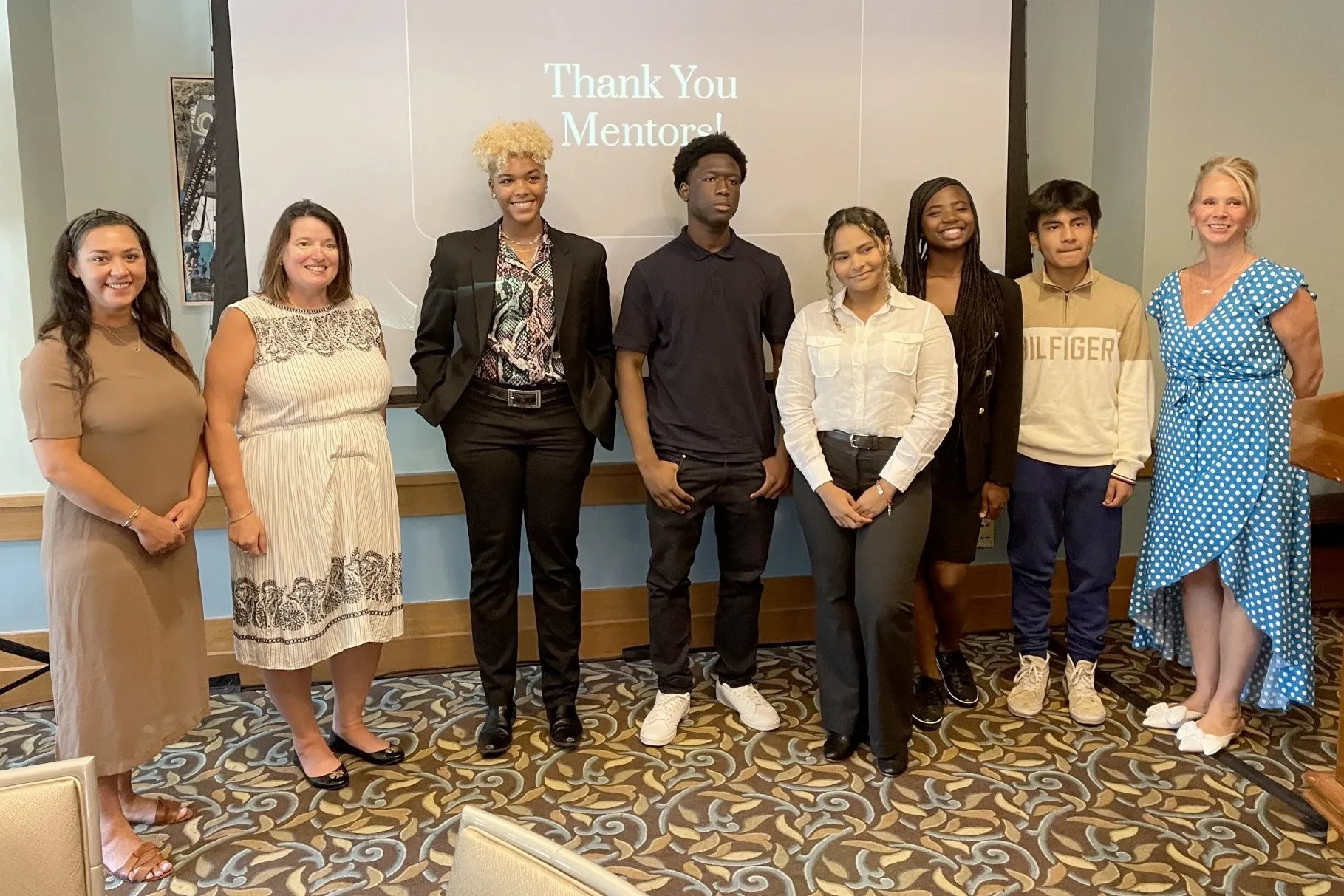 A group of student interns gather with members of Facilities and Operations's HR department.