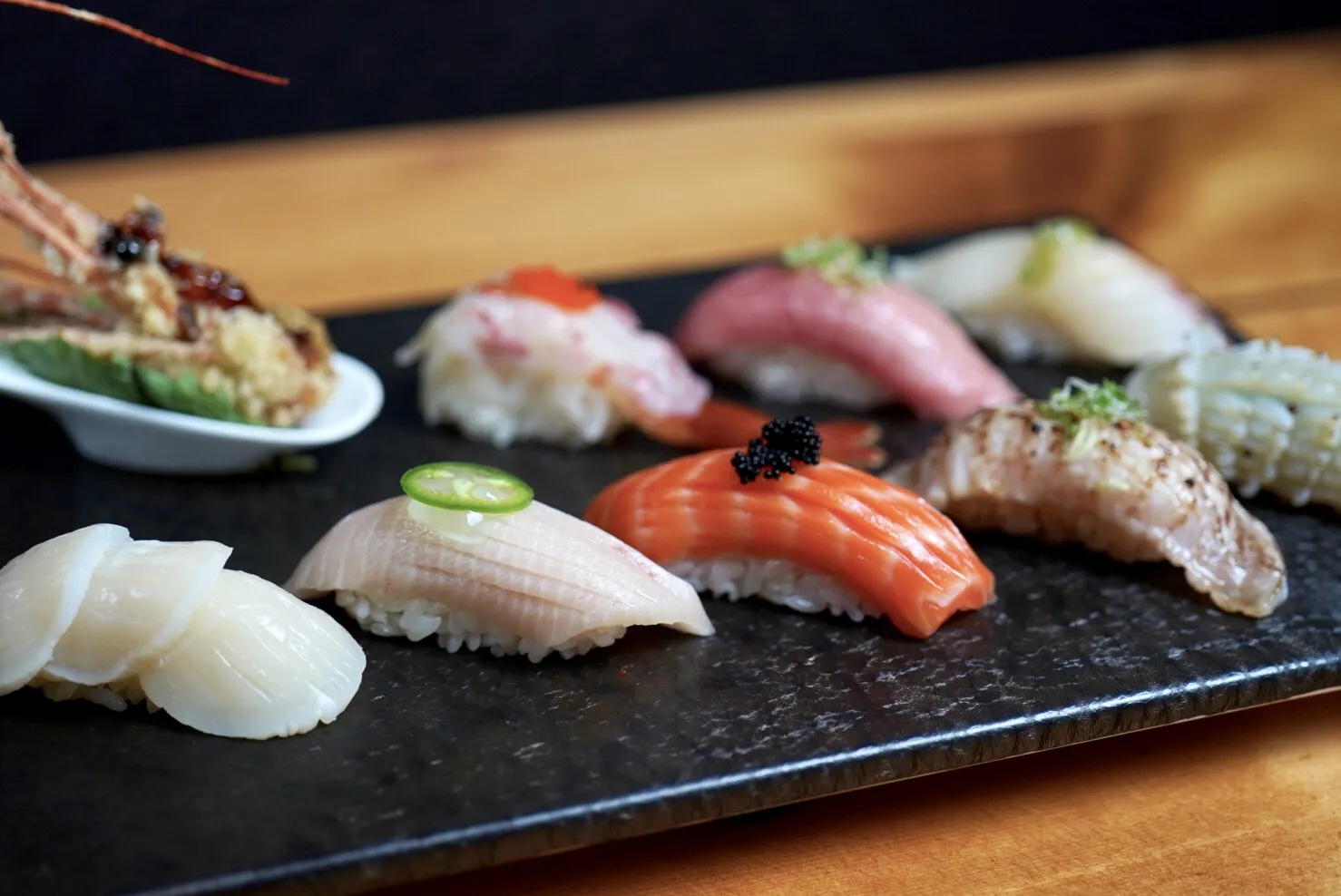 A plate of assorted sushi.